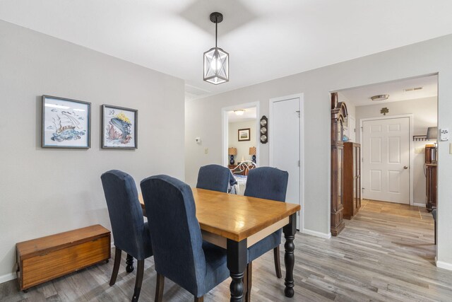 dining room featuring light hardwood / wood-style flooring