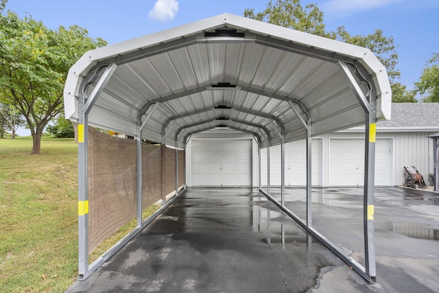 view of parking / parking lot featuring a yard, a garage, and a carport