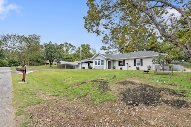 ranch-style house with a front lawn