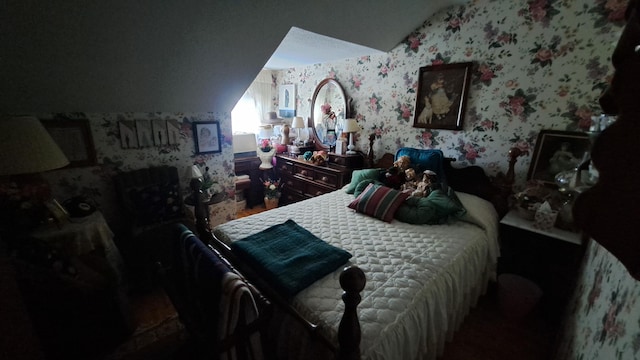 bedroom with vaulted ceiling