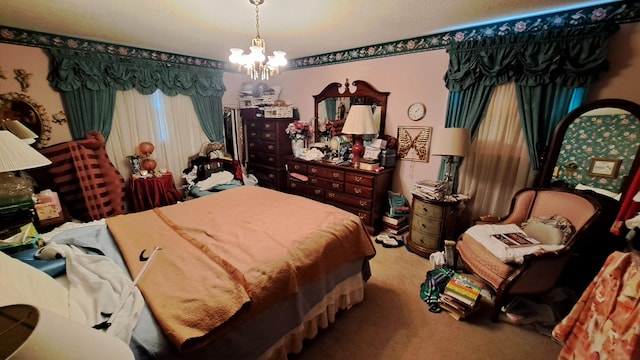 carpeted bedroom with a notable chandelier