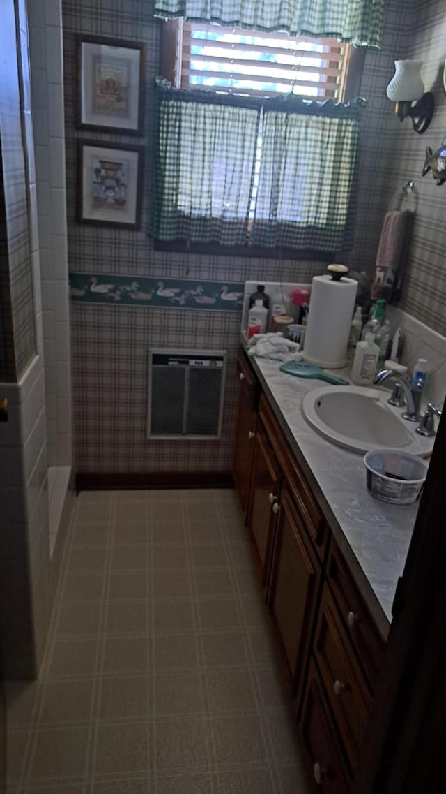 bathroom with a wealth of natural light and vanity