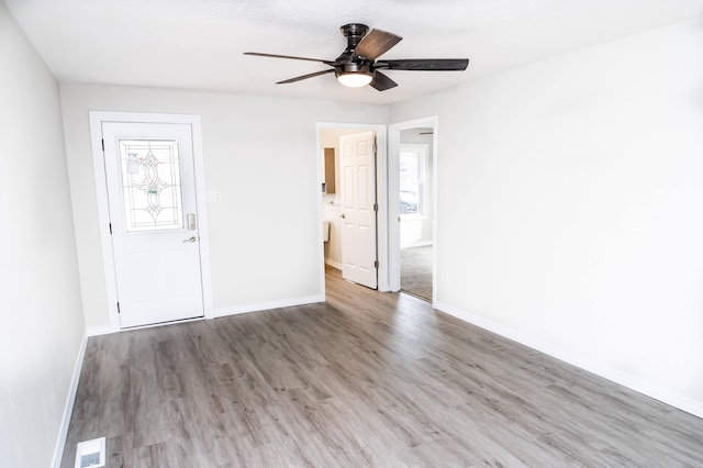 500 E Lincoln St, Buffalo, MO 65622 - unfurnished room with wood finished floors, visible vents, and baseboards