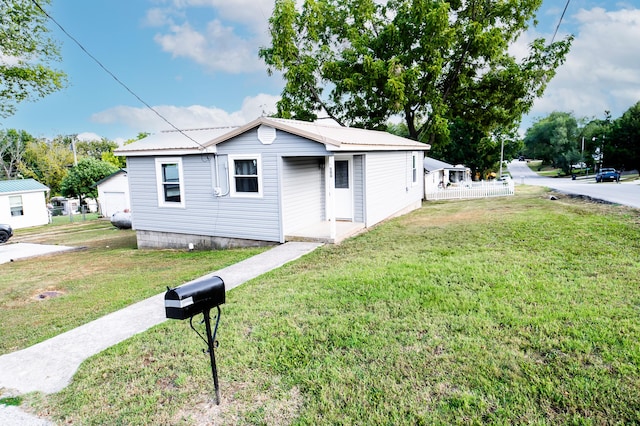 exterior space featuring a front lawn