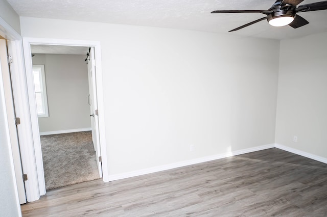 500 E Lincoln St, Buffalo, MO 65622 - unfurnished room featuring wood finished floors, baseboards, and ceiling fan