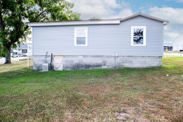 view of home's exterior featuring a lawn