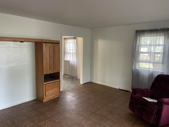 living room with dark parquet floors