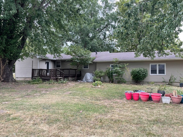 view of yard with a wooden deck