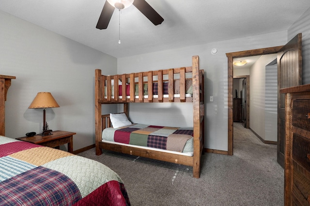 bedroom featuring ceiling fan and carpet flooring