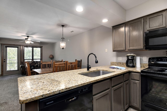 kitchen featuring black appliances, ceiling fan, sink, kitchen peninsula, and carpet floors