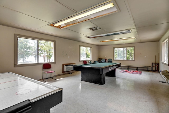 game room with pool table and a wall mounted air conditioner