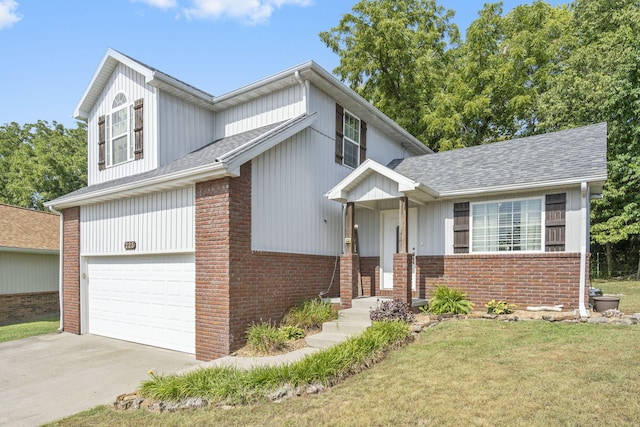 view of front facade featuring a garage and a front lawn