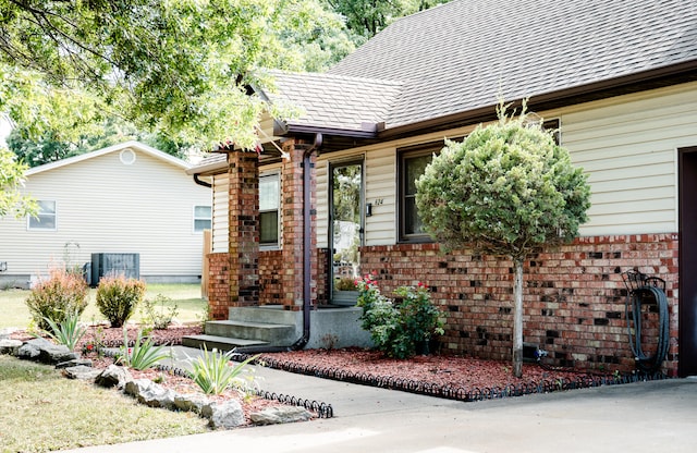 view of front of home featuring central AC unit