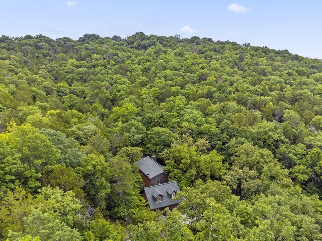 aerial view with a wooded view