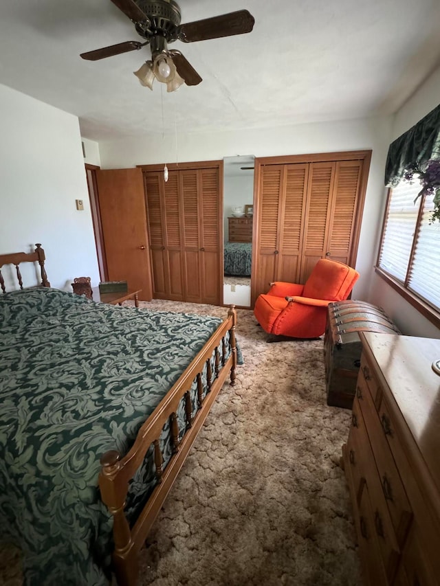 bedroom with ceiling fan and carpet flooring