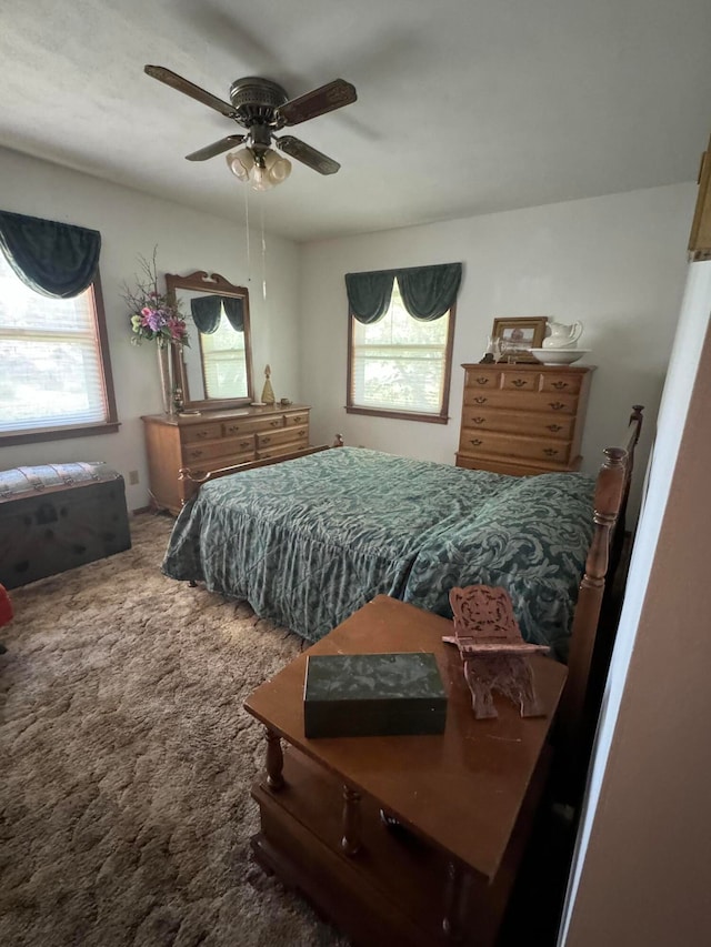 bedroom featuring ceiling fan and carpet floors