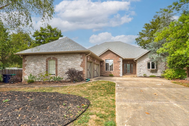 view of front of property with a garage