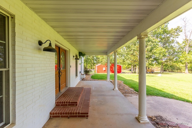 view of patio featuring an outdoor structure