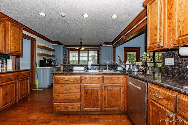kitchen with stainless steel dishwasher, ornamental molding, open shelves, and a sink