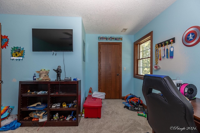 carpeted bedroom with visible vents and a textured ceiling