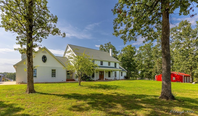 view of front facade featuring a front lawn and a porch