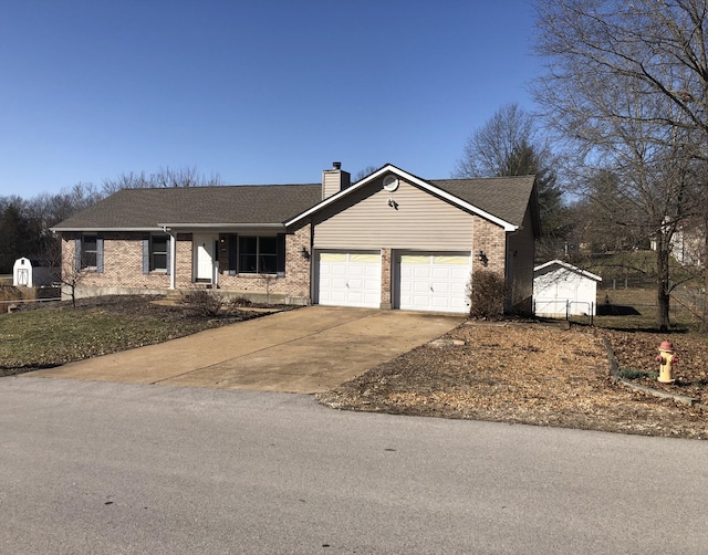 single story home with driveway, an attached garage, a chimney, and brick siding