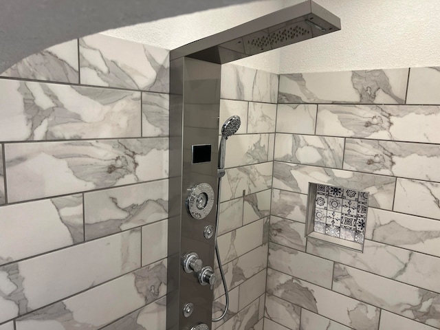 room details with a tile shower