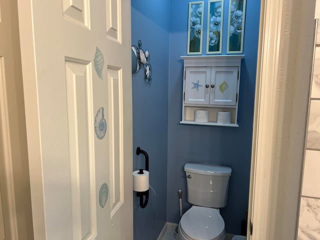 bathroom featuring toilet