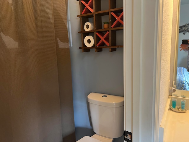 bathroom featuring toilet