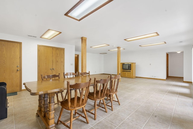 dining room featuring light tile patterned flooring