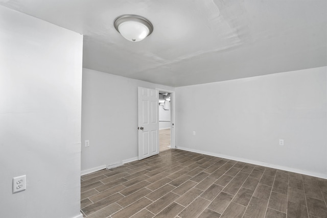 additional living space featuring dark hardwood / wood-style floors