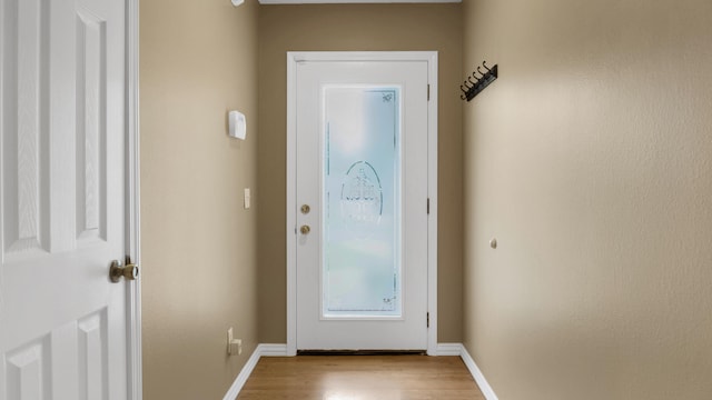 doorway to outside featuring light hardwood / wood-style floors