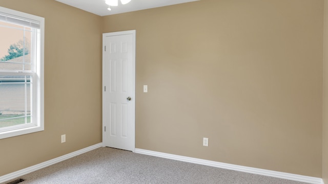 view of carpeted spare room