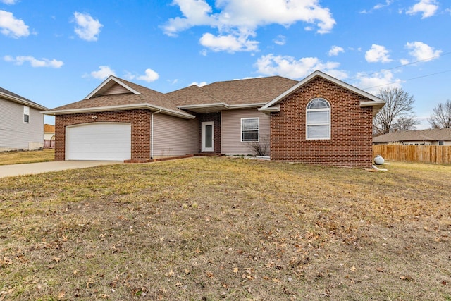 single story home with a garage and a front yard