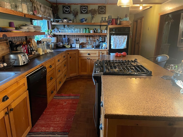 kitchen featuring black appliances and dark parquet flooring