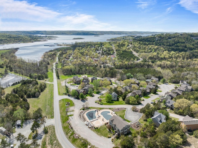 drone / aerial view with a water view