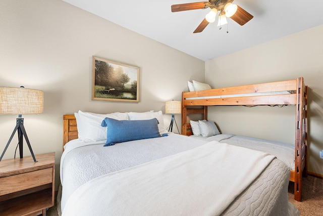 bedroom with ceiling fan and carpet