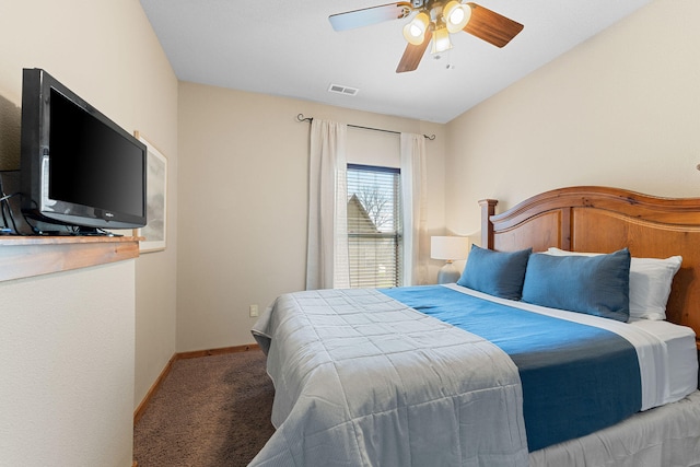 carpeted bedroom with lofted ceiling and ceiling fan