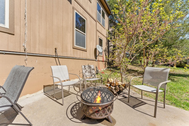 view of patio / terrace with a fire pit