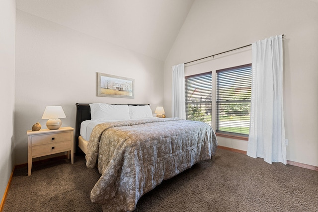 carpeted bedroom featuring high vaulted ceiling