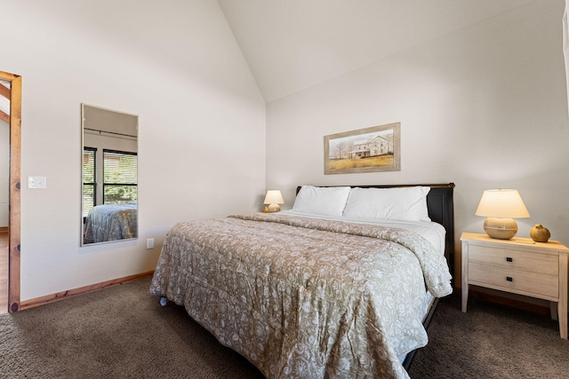 carpeted bedroom featuring high vaulted ceiling