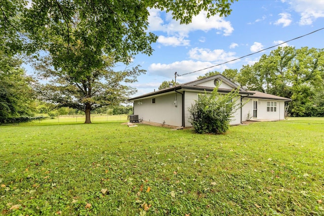 view of yard featuring central AC