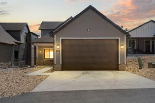 ranch-style home with a garage