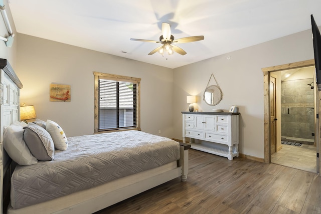 bedroom with wood-type flooring, ensuite bath, and ceiling fan