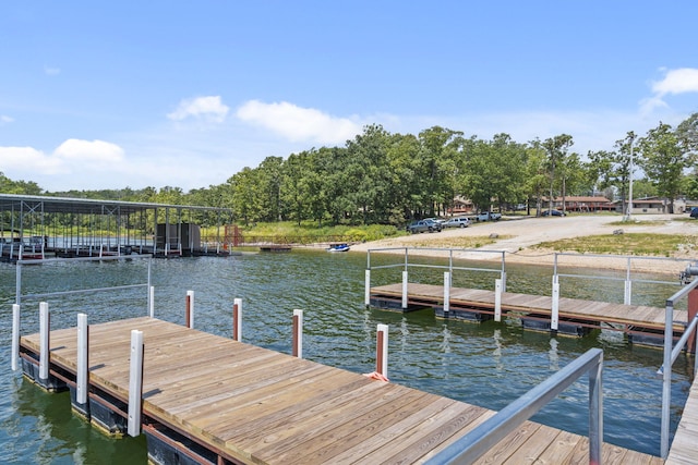 view of dock with a water view