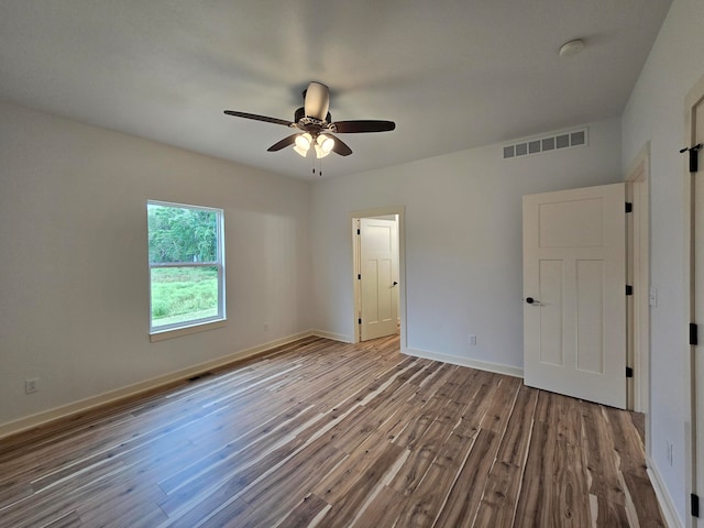 unfurnished bedroom with wood-type flooring and ceiling fan