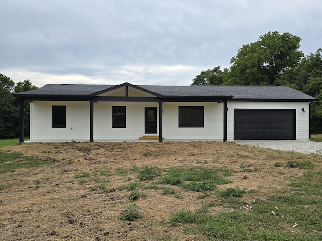 ranch-style home with a garage