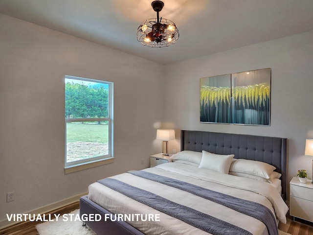 bedroom featuring hardwood / wood-style flooring