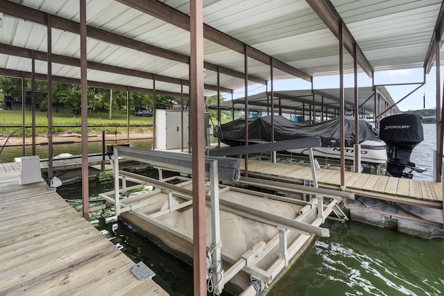 dock area featuring a water view