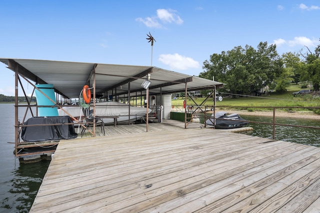 dock area with a water view